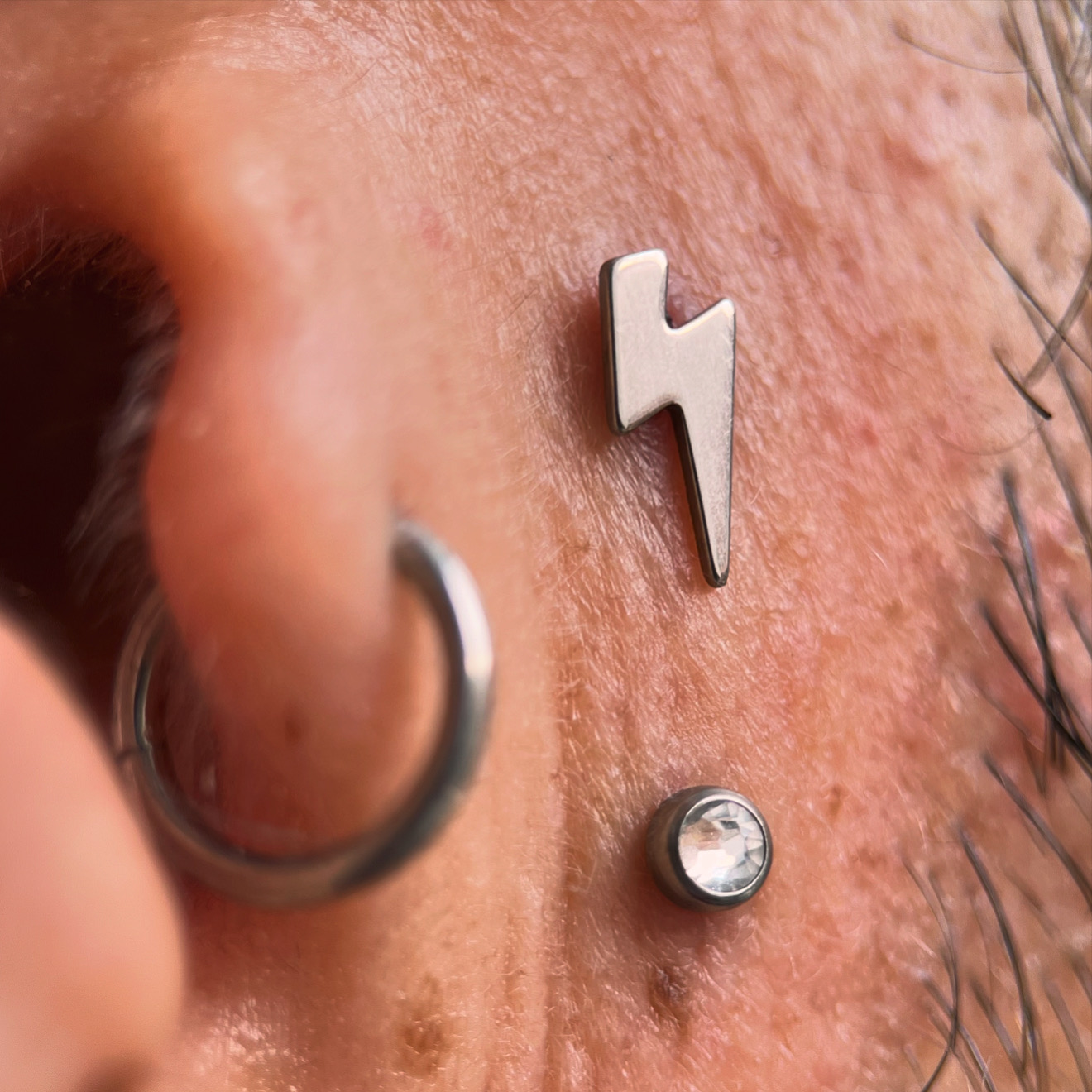 Surface piercing with titanium jewelry reference
